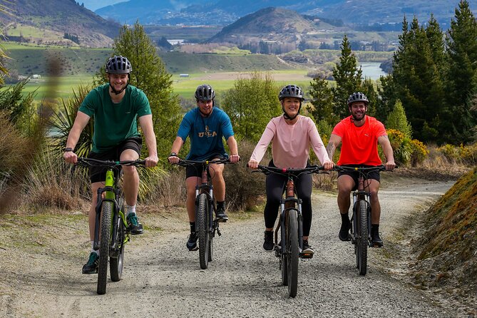 Explore Queenstown's Scenic Trails with an Electric Bike - Following the Queenstown Trail beside lake and river