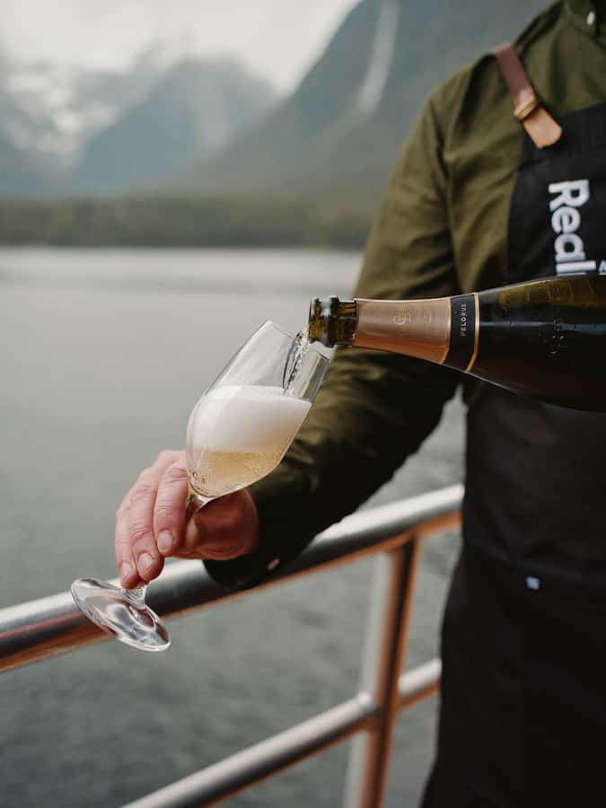 From Queenstown: Milford Sound Business Class with Cruise - A five-course meal that follows the scenery