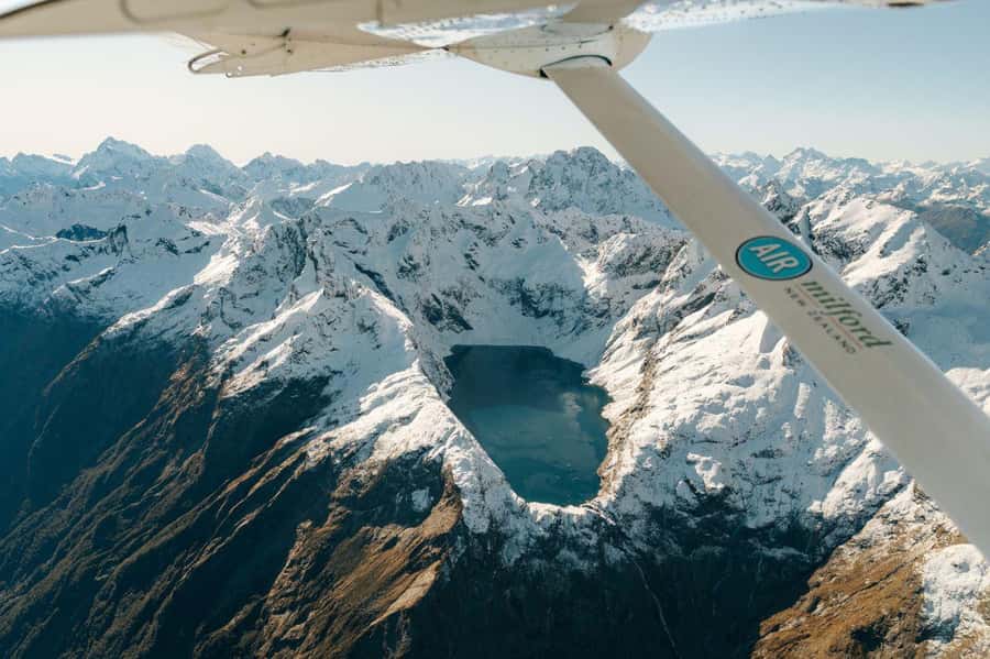 From Queenstown: Milford Sound Flight and Nature Cruise - Landing beneath Mitre Peak