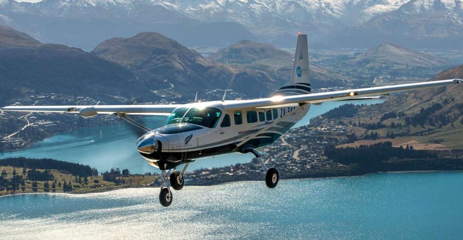 From Queenstown: Milford Sound Flight and Nature Cruise - A smaller boat on Milford Sound
