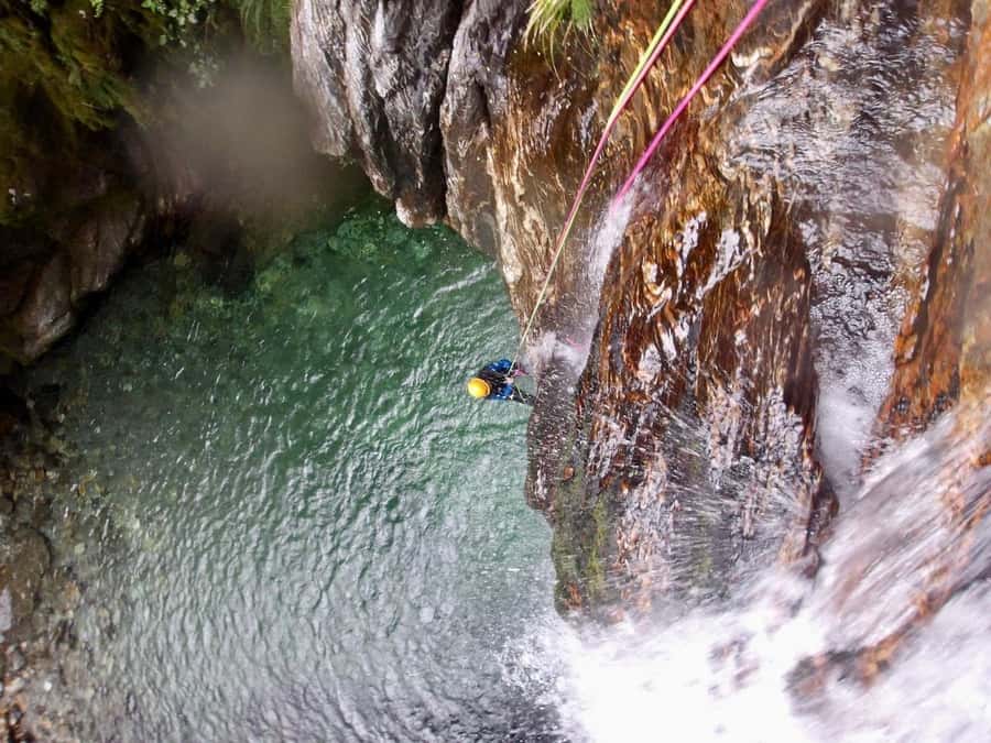 From Queenstown: Mount Aspiring Full-Day Canyoning Adventure - Climbing, jumping, swimming, sliding, and abseiling