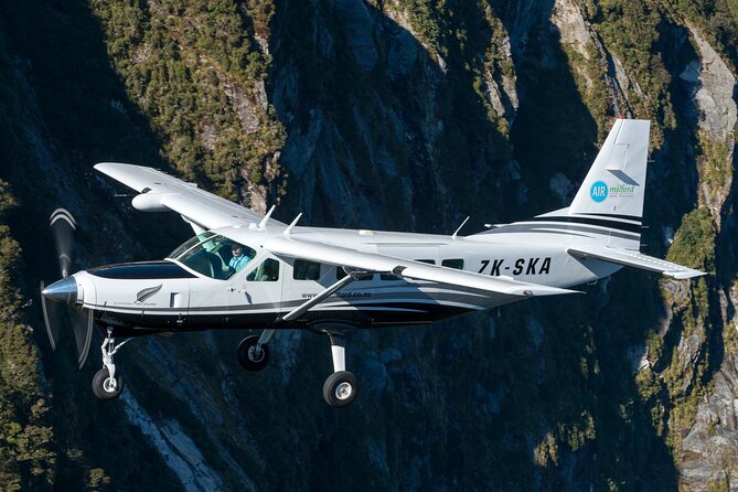 Milford Sound Flight and Cruise ex Queenstown (incl Lunch) - Cruising beneath Bowen Falls and Mitre Peak