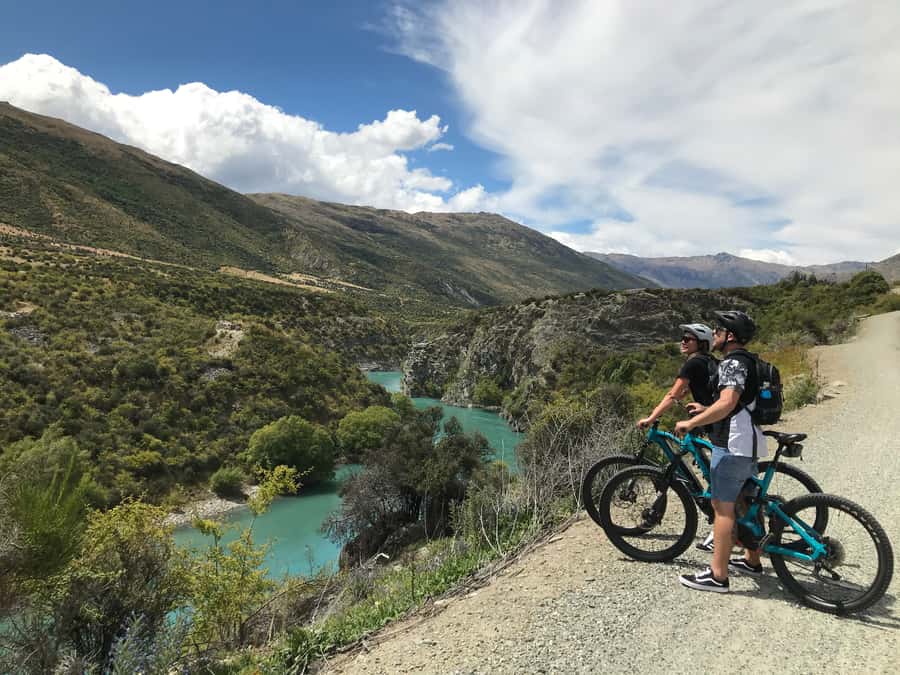 Queenstown: Guided E-Bike Tour with Winery Visits & Tastings - Crossing bridges toward the Kawarau