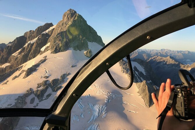 Queenstown Helicopter Tour: Glacier Landing and Scenic Views - Tyndall Glacier’s blue ice and crevasses