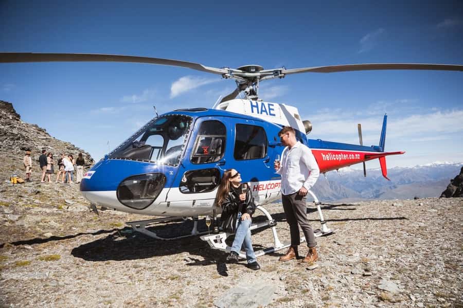 Queenstown: Helicopter & Wine Tasting Tour - Taking off above Queenstown