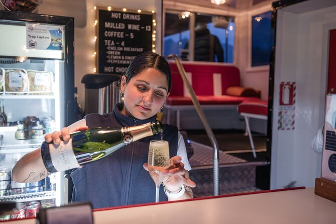 Queenstown: Lake Wakatipu Scenic Cruise (90 Minutes) - Heated cabin, open deck, bar, and family touches
