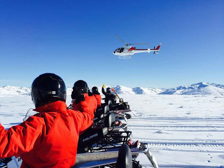 Queenstown: Snowmobiling Experience with Helicopter Flight - Landing on a snowy Garvie Mountain plateau