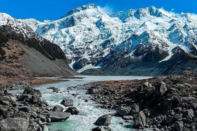 Queenstown to Christchurch One Way Tour Via Lake Tekapo & Mt Cook - The blue water of Lake Pukaki
