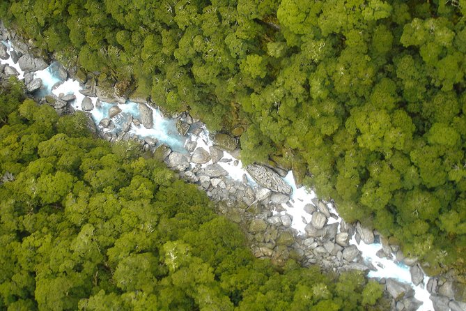 Siberia Experience:Fly-Hike-Jetboat:Wilderness Adventure:Wanaka - Descending to the river and handling the crossing